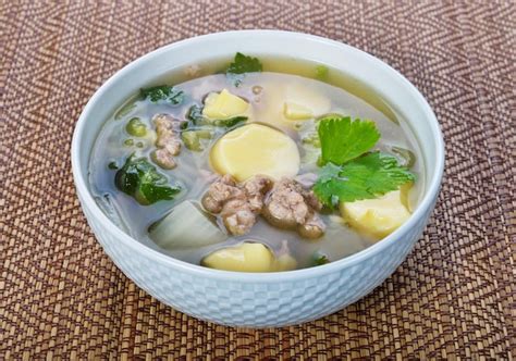 Premium Photo Clear Soup With Tofu And Minced Pork