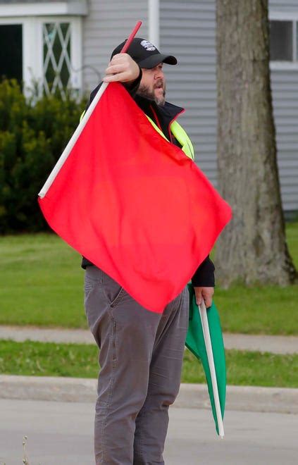 Manitowoc Franklin Elementary School Crossing Guard Uses Racing Flags