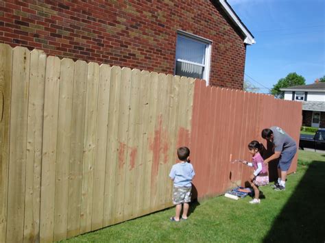 Travels and Wandering: Painting the Fence.. a family thing.