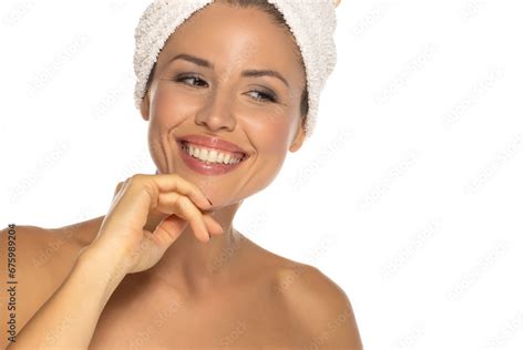 Beauty Portrait Of A Cheerful Attractive Half Naked Woman With A Towel