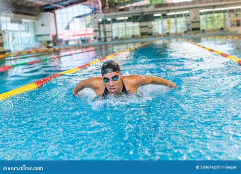 Swimmer In The Butterfly Stroke Arms Movement And Breath Technique