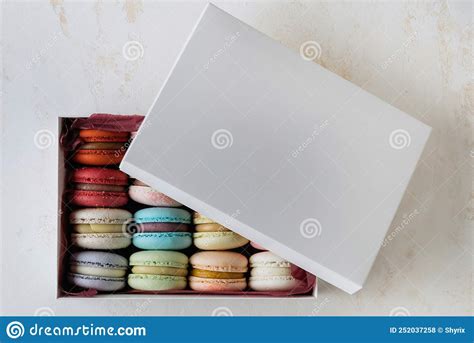 Colorful Macaroons in a Gift Box on a White Table. Stock Photo - Image ...