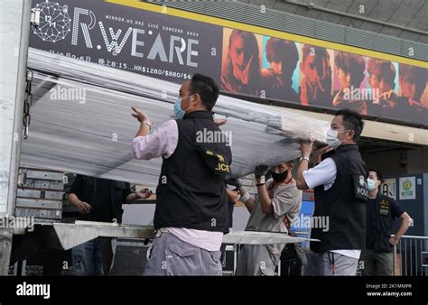 Officers From The Hong Kong Police Force Collect Evidence Including