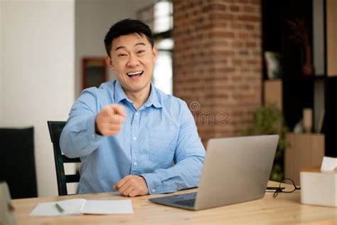 Hey You Happy Mature Asian Man Pointing Finger At Camera And Smiling