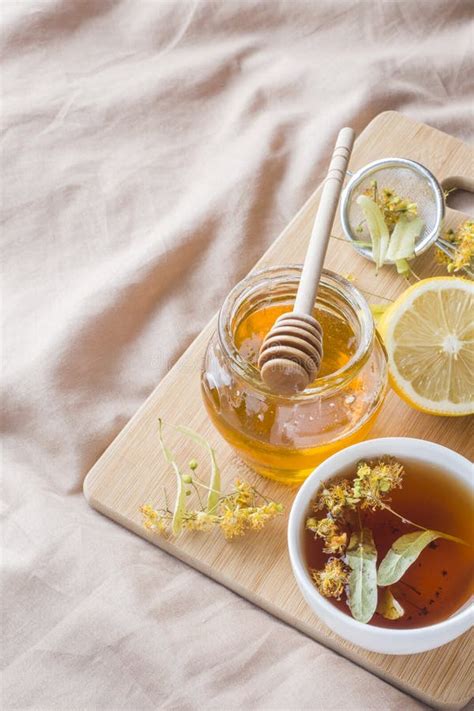 Tea with Linden, Honey and Lemon. the Tray on the Bed, the Concept of the Treatment of Colds ...