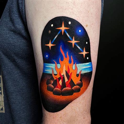 Campfire Tattoo Located On The Upper Arm