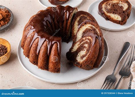 Marbled Bundt Cake Sliced On A Plate Chocolate And Vanilla Marble Cake With Chocolate Glaze