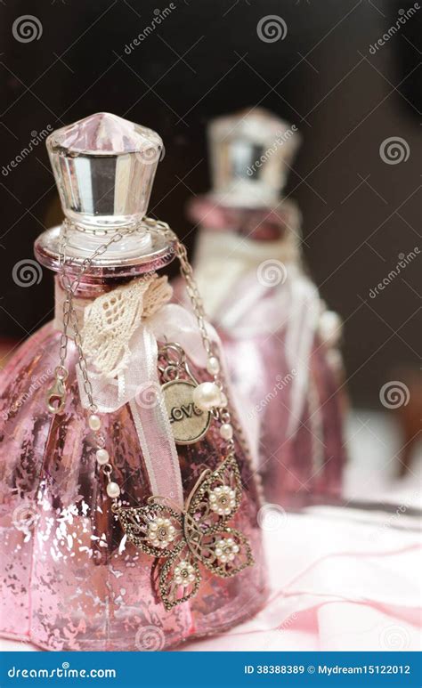 Pink Perfume Bottle with Pendant Stock Image - Image of aromatic, light ...