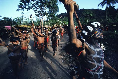 Yanomami Warriors Dance In A Parade Photograph by Robert Caputo | Fine Art America