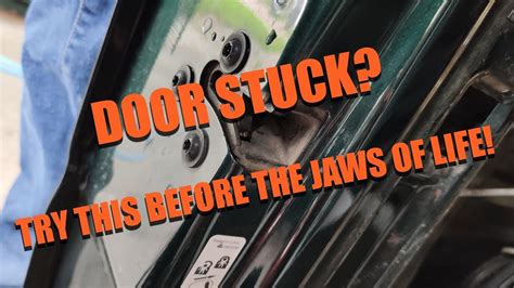 how to open a stuck car door