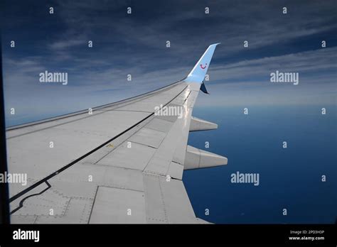 A Wing Of A Boeing 737 Tui Chartered Airplane Taken In Flight Showing