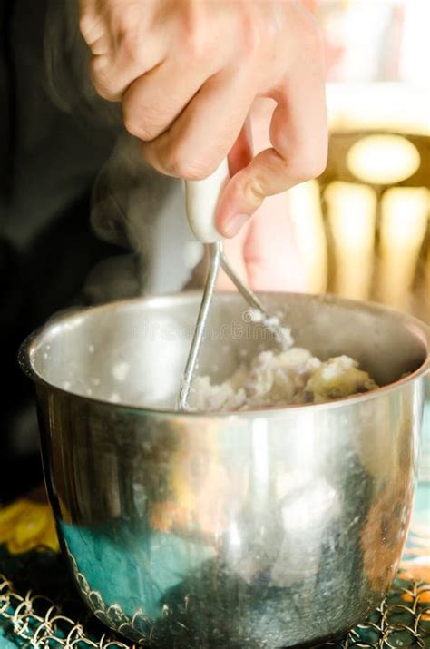 Mashing Potatoes stock image. Image of kitchen, vertical - 40655081