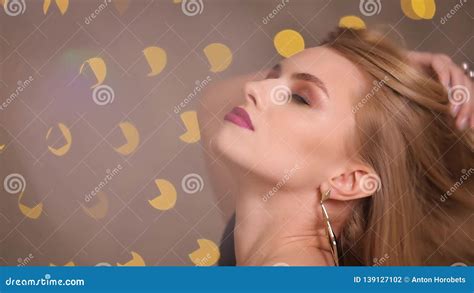 Fashion Model With Beautiful Hair Posing In Yellow Lights Bokeh Slow