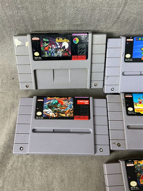 Super Nintendo vintage video game collection lot streetfighter super Mario Looney Tunes