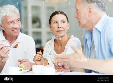 Mature Friends Talking Stock Photo Alamy