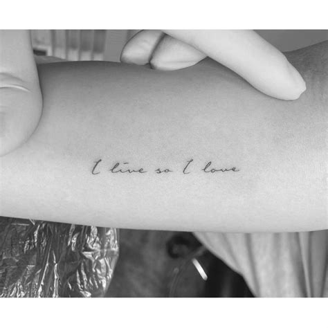 I Live So I Love Lettering Tattoo Located On The