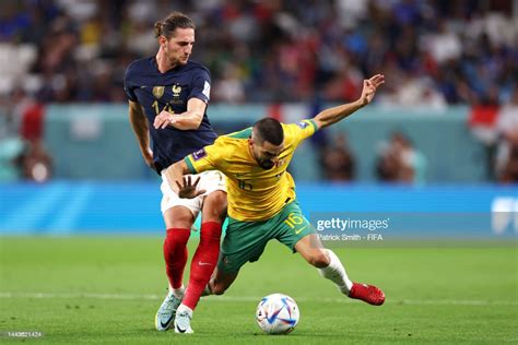 Aziz Behich Of Australia Battles For Possession With Adrien Rabiot Of