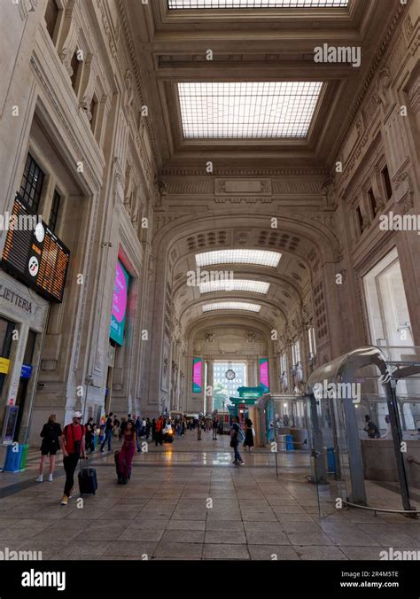 Interior Of Milan Centrale Railway Station Travellers Wheel Their