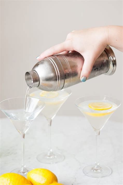 Classic Vodka Martini with a Twist - 4 ounces vodka 1 ounce dry vermouth Lemon for garnish Fill ...