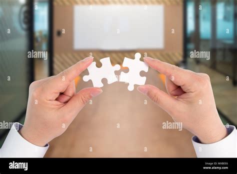 Two Hand Holding Connecting Piece Jigsaw Puzzle Business Connection