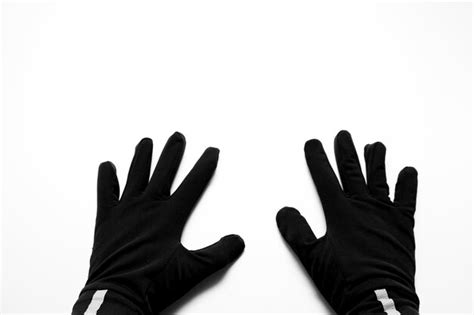 Premium Photo Close Up Of Hand With Gloves Against White Background