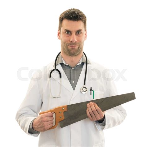 Crazy Doctor Is Holding A Big Saw In His Hands Stock Image Colourbox