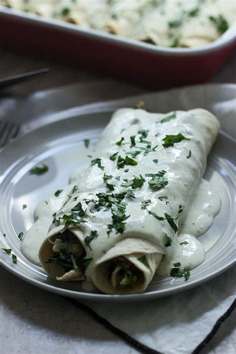 Spinach Chicken And Cheese Enchiladas With Jalapeño Cream Cheese Sauce