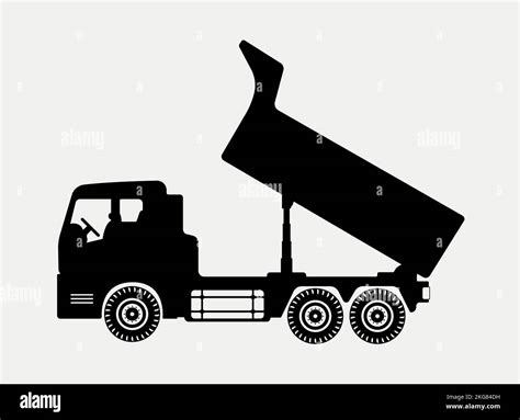 A Vector Illustration Of Dump Truck Silhouette Isolated On White