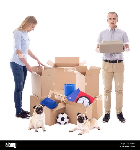 Moving Day Concept Couple Packing Cardboard Boxes Isolated On White