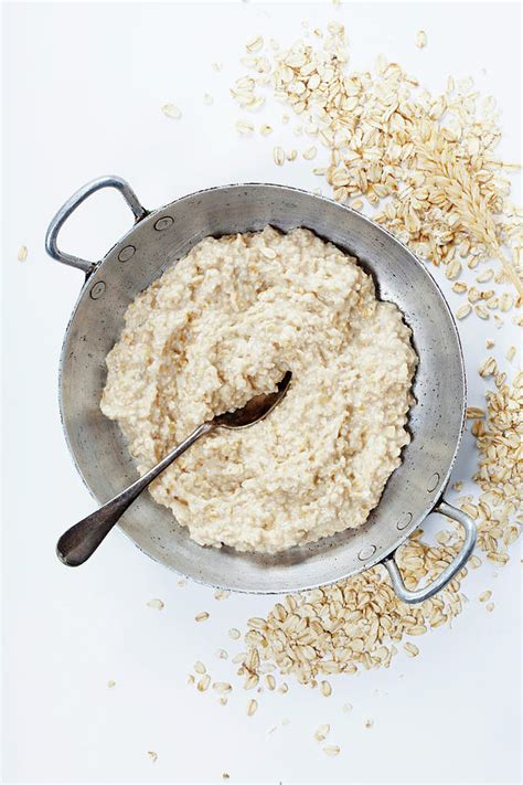 Bowl Of Oatmeal Porridge Photograph By Natalia Klenova Fine Art America