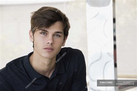 Portrait of handsome young man in black polo shirt — male, self ...