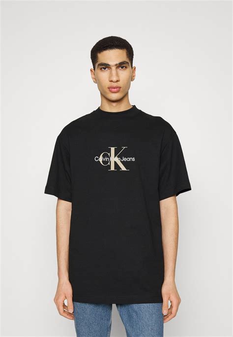 Calvin Klein Jeans Archival Monologo Tee T Shirts Med Print Blacksvart Zalandono