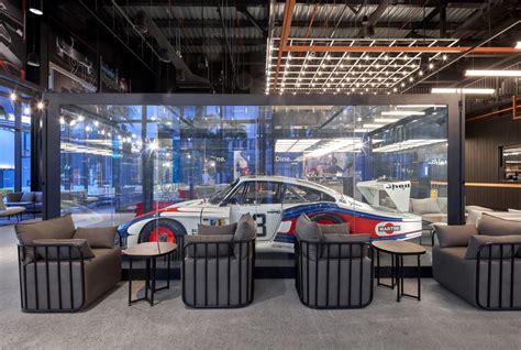 Design of DRVN car cafe saw Studio EM elevating 1,500kg luxury motors