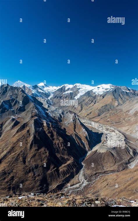 Arid Glaciated Mountain Terrain On The Tibet Nepal Border Of The