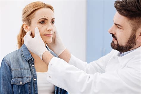 Handsome Nice Doctor Holding His Patients Face Dr Andr Ara Jo