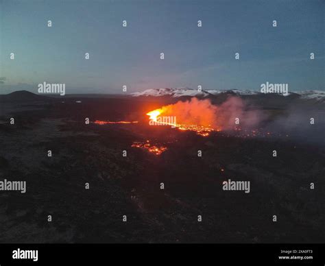 Grindavik Iceland 07 April 2024 Lava Spews From Magma Vents And The Cone Of The