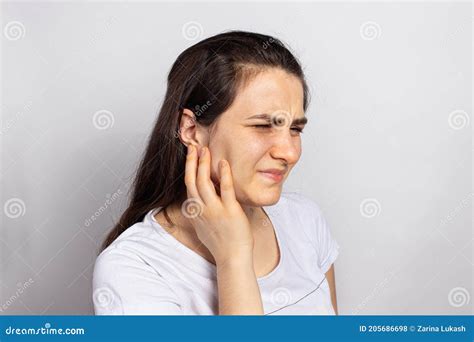 The Woman Has a Sore Ear - Infection, Inflammation from Infection and Otitis. Perforation ...