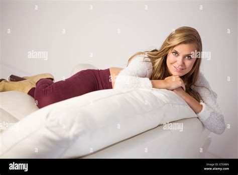 Pretty Blonde Relaxing On The Couch Stock Photo Alamy