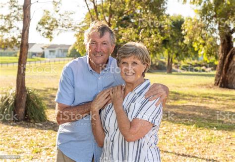 Portrait Of Caucasian Senior Couple In Their 70s Embracing Showing Love And Affection In The