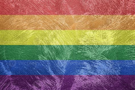 Rainbow LGBTQ Or Gay Pride Flag On Decorative Plaster Or Concrete Texture Abstract Background