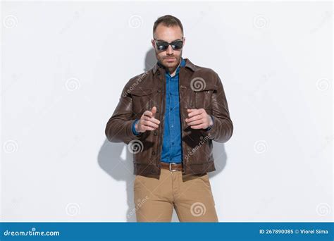 Casual Guy Wearing Brown Leather Jacket and Sunglasses Posing Stock ...