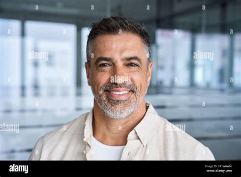 Headshot Portrait Of Confident Handsome Mature Middle Age Businessman
