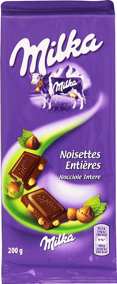 Milka Cioccolato Al Latte Con Nocciole Intere 200 G Amazon It