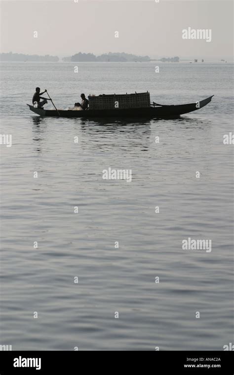 On Kaptai Lake Fisherman Inspects Hi Res Stock Photography And Images