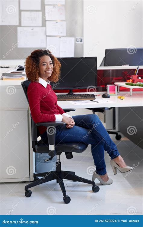 She Loves What She Does And It Shows Portrait Of A Young Woman Sitting At Her Workstation In An