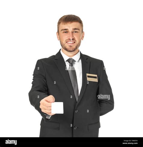 Male Hotel Receptionist With Card On White Background Stock Photo Alamy