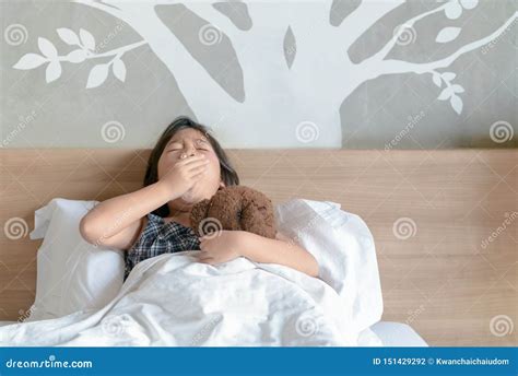 Kid Yawning On Bed In Morning Stock Photo Image Of Rest Bedroom