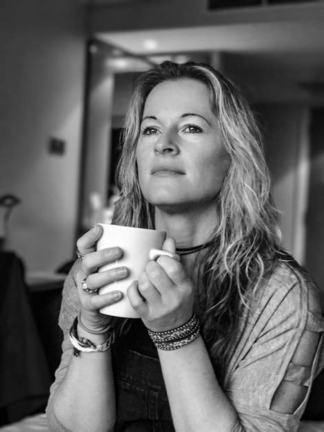 Premium Photo Close Up Of Mature Woman Drinking Coffee At Home