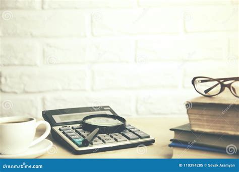 Glasses On Book And Magnifying Glass On Calculator Stock Image Image