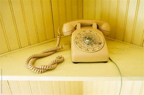 "Vintage Yellow Rotary Dial Telephone" by Stocksy Contributor "Raymond ...